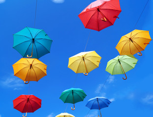Fototapeta na wymiar Umbrellas in the sky in good weather