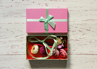 Top view of a gift box with hand-made stuff