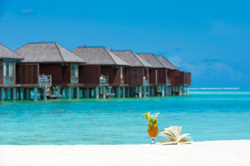 cocktail with blur beach on background