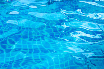 Fototapeta na wymiar Blue ripped water in swimming pool,Water abstract background.