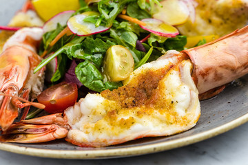 Green salad with fried royal prowns.