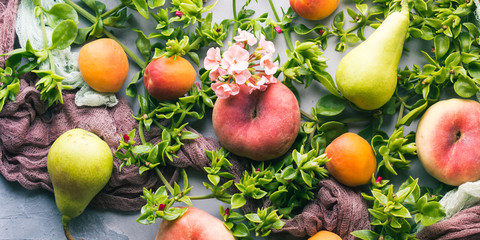 Fresh summer fruit concept still life - peaches, apricots and pears