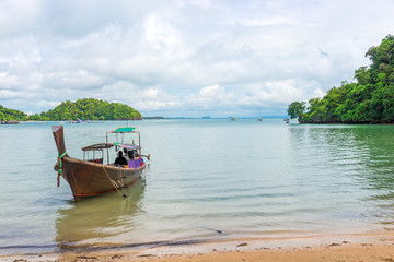 Fototapeta na wymiar View of Thai wooden boat and scenic landscape, Thailand