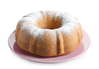 Pink plate with yogurt cake on white background