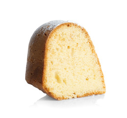 Slice of delicious yogurt cake on white background