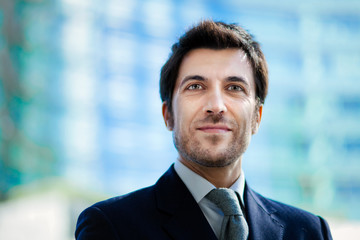 Confident handsome businessman outdoor