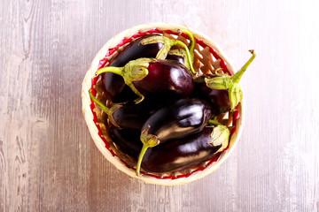 Mini eggplants in a basket