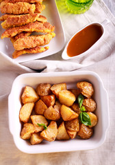 Roast potatoes and chicken nuggets