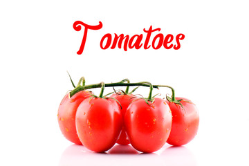 Branch of fresh red tomatoes on isolated white backround