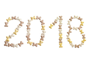 text of numbers 2018 of dog cookies. Symbol of new year 2018. isolated on a white background.