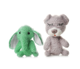 Adorable crochet baby toys isolated on white