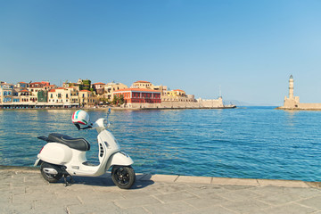 travel image of retro scooter in old greek town