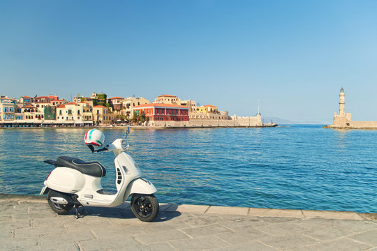 Fototapeta travel image of retro scooter in old greek town