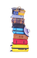 Pile of different heavy luggage on white background. Overweight concept