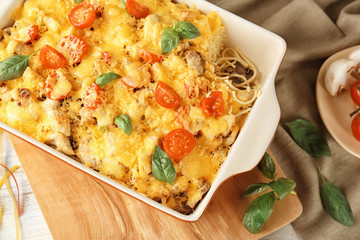 Delicious roasted turkey tetrazzini in baking dish on kitchen table