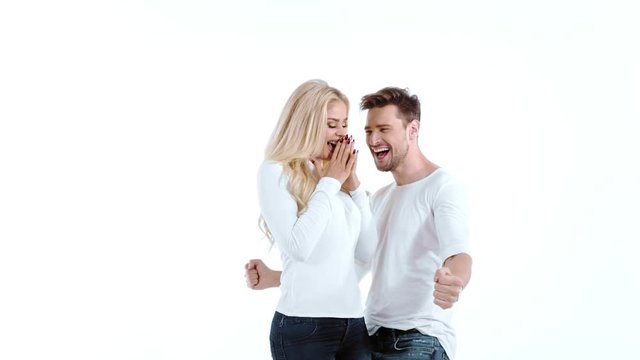 Sexy young couple posing on studio background, 4k slow motion studio clip