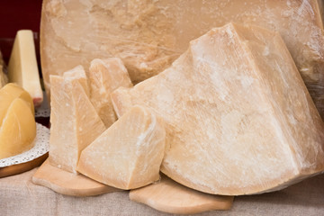 Chunk of Parmesan cheese at outdoor market