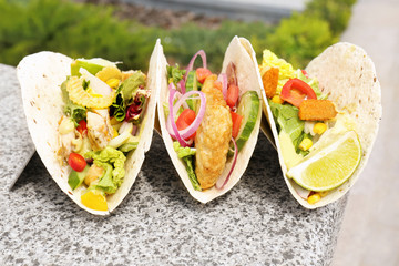 Delicious fish tacos in holder outdoor