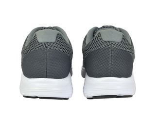 Back view of two gray sneakers on white background