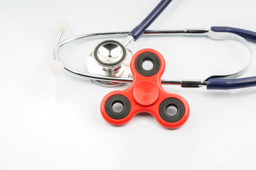 Fidget spinner with autistic therapy concept