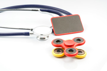 Fidget spinner with autistic therapy concept