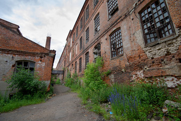 Fototapeta na wymiar A destroying fabric factory built in the 19th century. Ivanovo Region, central Russia.