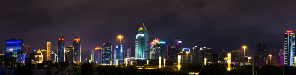 Fototapeta na wymiar NANNING, CHINA - Modern business and residential buildings of Qingxiu District. Nanning is the capital city of Guangxi province
