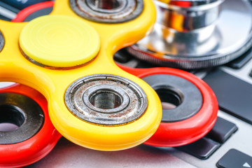 Fidget spinner with autistic therapy concept