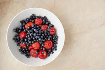 Assorted blueberries and strawberries