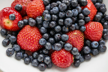 Assorted blueberries and strawberries