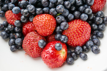 Assorted blueberries and strawberries