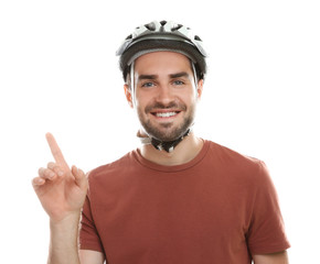 Handsome young bicycle rider with helmet on white background