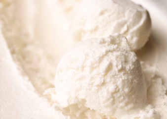 Tasty homemade vanilla ice cream scoops, closeup