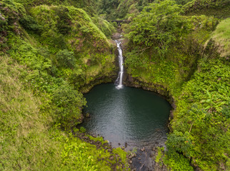 Naklejka na ściany i meble A waterfall on the road to Hana, Maui Hawaii