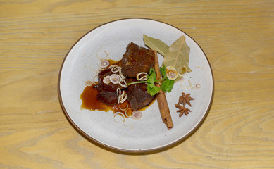 Bake pork ribs  lemongrass sauce with cinnamon and star Anise.