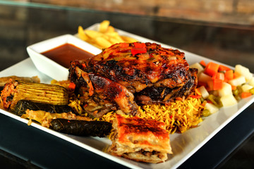 Meals of chicks, meat, shish tawook, rice and appetizers , grilled