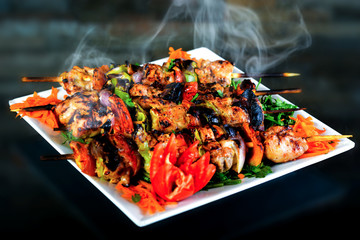 Meals of chicks, meat, shish tawook, rice and appetizers , grilled