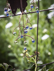 A closeup of glass bead garden decoration
