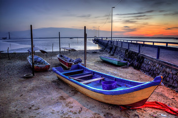 Fototapeta na wymiar Sunrise and sunset view with boat