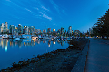 Vancouver BC Skyline along Stanley Park Seawall in Canada