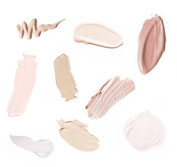 Liquid makeup foundations/blush on white background