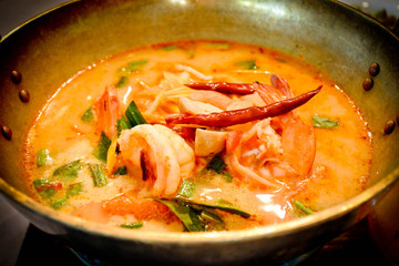 Tom-Yam-Kung, Most famous Thai food. Sour and spicy soup with prawn, chilly and herb.
