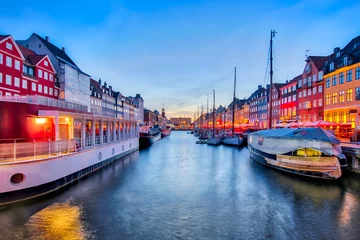 Fototapeten Nyhavn with colorful facades of old houses in Copenhagen, Denmark © orpheus26