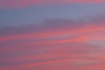 Blur background texture of colorful sunset clouds in horizontal frame