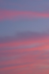 Blur background texture of colorful sunset clouds in vertical frame