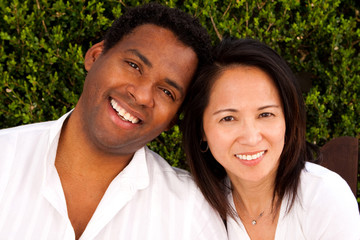 Portrait of a happy biracial couple. - Powered by Adobe