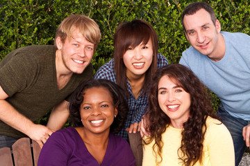 Obraz premium Diverse group of friends talking and laughing.