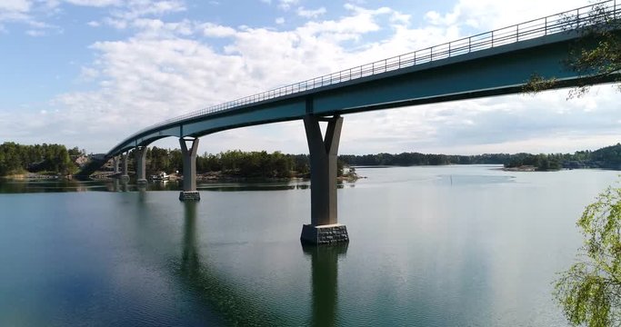 Lovon silta, Cinema 4k aerial rising view above the lovo bridge connecting kemionsaari and kasnas, in the finnish archipelago, in Varsinais-suomi, Finland