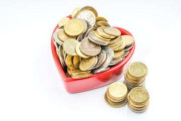 Coins inside red mug shape.