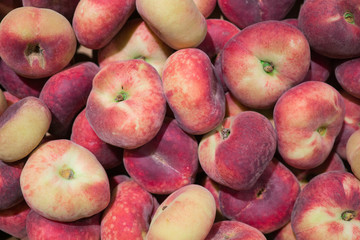 Fresh, ripe, juicy peaches collected in the garden.